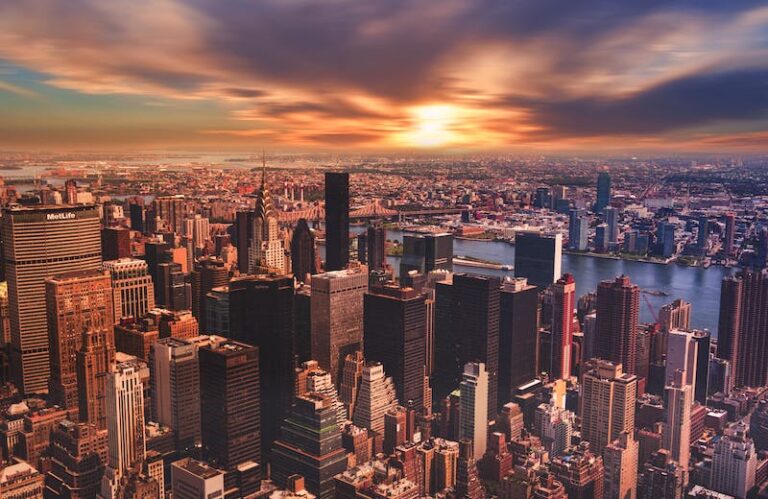 Aerial view of the Manhattan skyline and East River at sunset